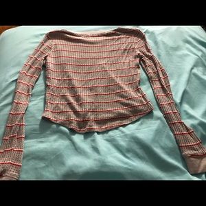 red,white and gray tight fitting shirt